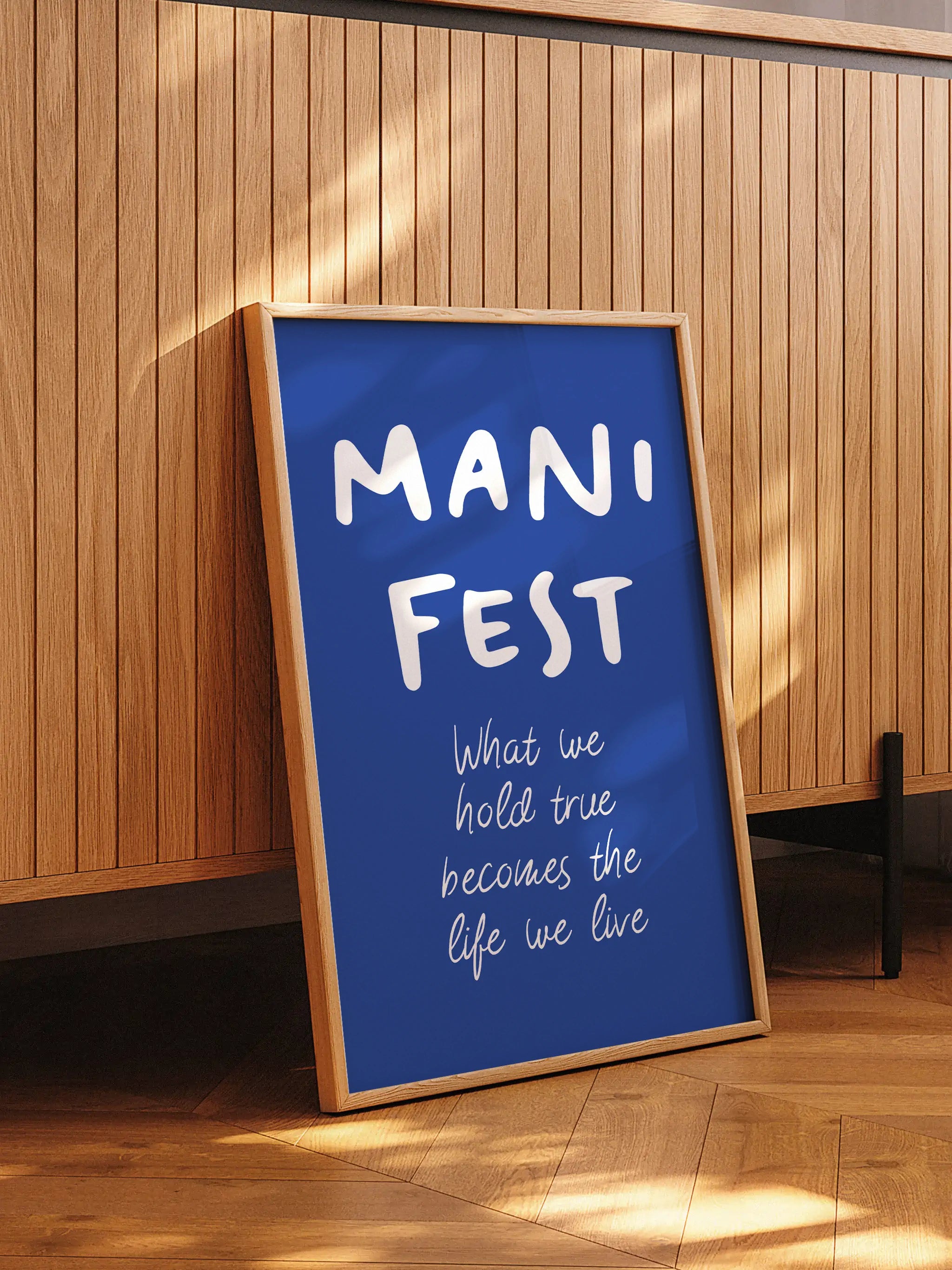 Modern motivational wall art featuring "Manifest" and an uplifting message.